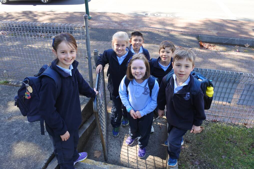 Walk with friends: Bowral Public School's Sofia, Matilda, Samuel (front), Danni, Brody and Jasper arriving safely at school. Photo: Claire Fenwicke