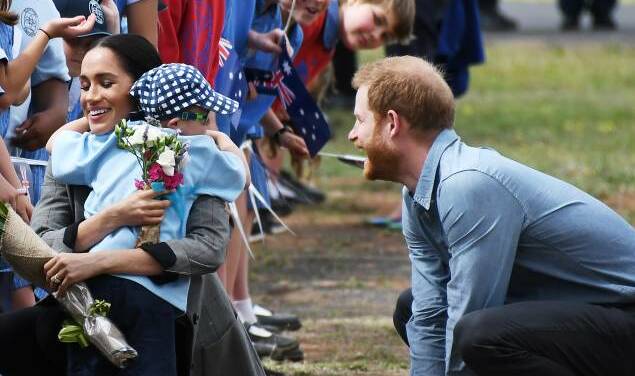 NEW MUM: The Duchess of Sussex gets a hug from Buninyong Primary School student Luke Vincent in the most heart-warming moment of Meghan and Harry's visit to Dubbo last year.