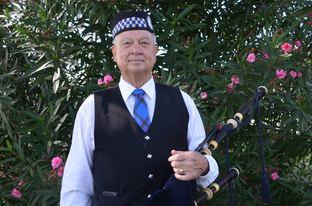 PIPING PASSION: Batehaven's Rod Parker has been recognsied for a lifetime dedication to pipe bands in this year's Australia Day Honours. Pictured on Australia Day at Corrigans Beach.
