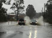 PLAY IT SAFE: A severe weather warning has been issued for large parts of the South Coast and authorities are urging motorists not to drive in flood waters.