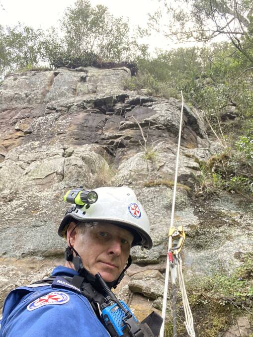 CLIFF OPERATION: NSW Ambulance Rescue Paramedic Wes Foster abseiled part way down the cliff face to try and find Lilly. Image: Supplied