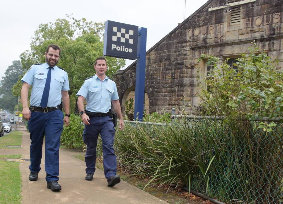 Officer in charge of the Bay and Basin Police Station, Acting Inspector Luke Geradts (left) and Senior Constable Todd Cremer outside the historic Kangaroo Valley courthouse and police station.