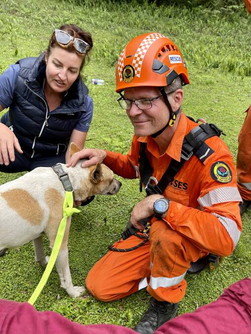 RESCUER: Wingecarribee SES member Peter Saw and owner Tania Sharman with Lilly after her dramatic rescue. Image: Supplied