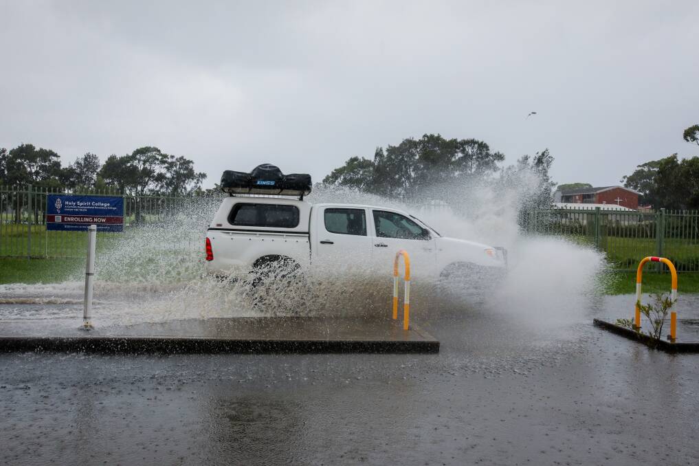 Gladstone Street in Bellambi on Wednesday, during heavy rainfall in the Illawarra. Picture: Wesley Lonergan