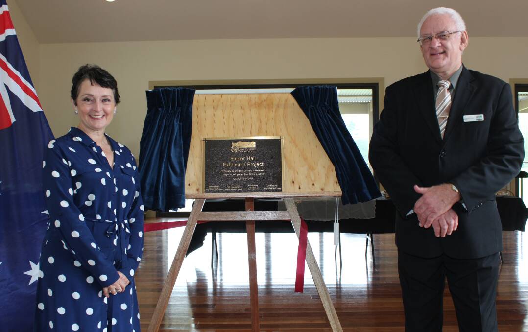 Unveiled: Goulburn MP Pru Goward and Wingecarribee Shire Council mayor Councillor Ken Halstead unveil the new hall plaque. Photo: WSC