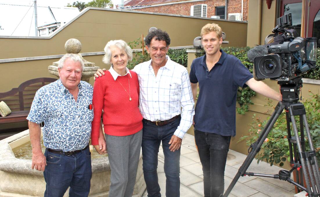 Mike (third from left) is pictured here at the old Bank Hotel with (from left) the hotel’s owners,  Warwick and Barbara Wainberg, and cameraman Chris Erdos. Photo: supplied