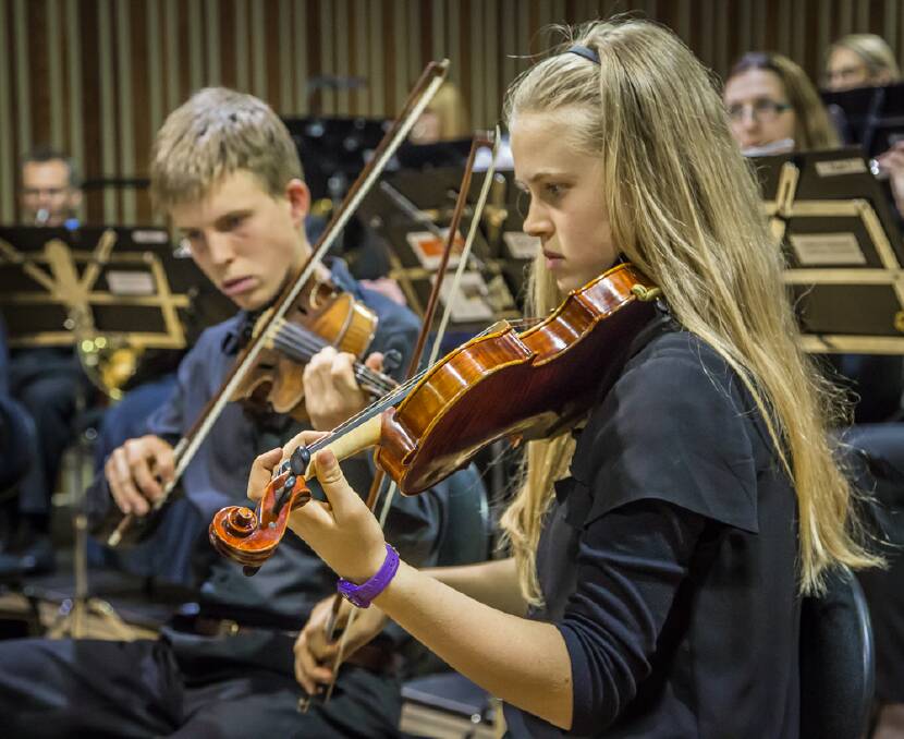 Brother and sister violinists Matthew and Rachel Heywood will pursue their studies with private tutors. 