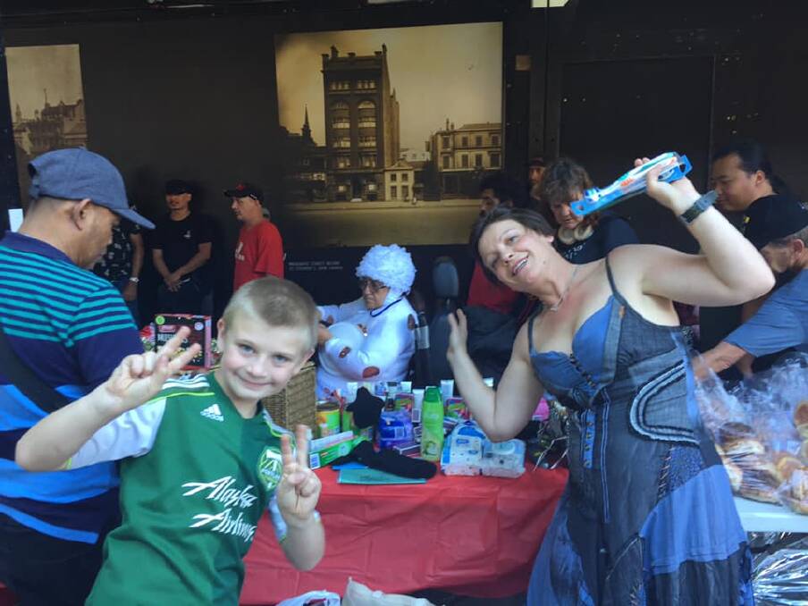Luca Fidler and his mum Simona Angeli spent Christmas day at Martin Place with people who are homeless.