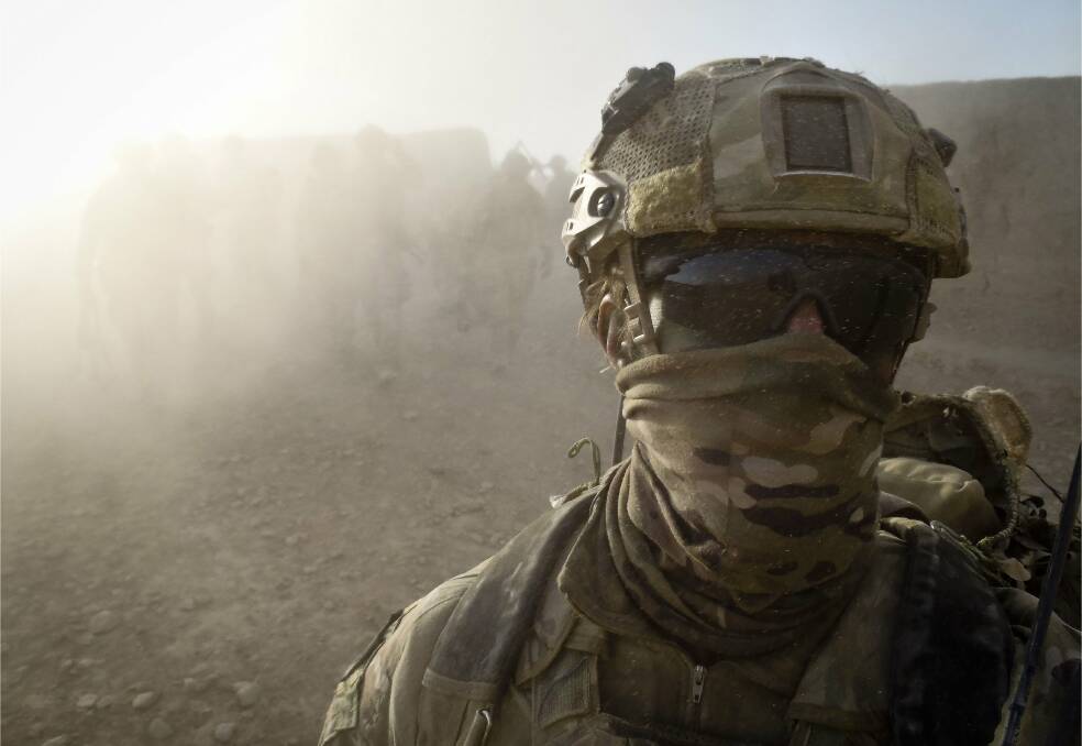 An Australian special forces soldier returns to base after a mission in Helmand province, southern Afghanistan, in 2012. Picture: ADF