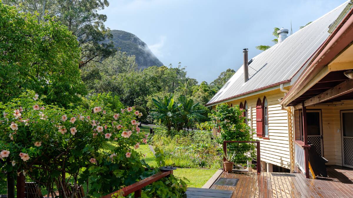 Mount Tibrogargan looms over the Glass House Mountains Ecolodge.
