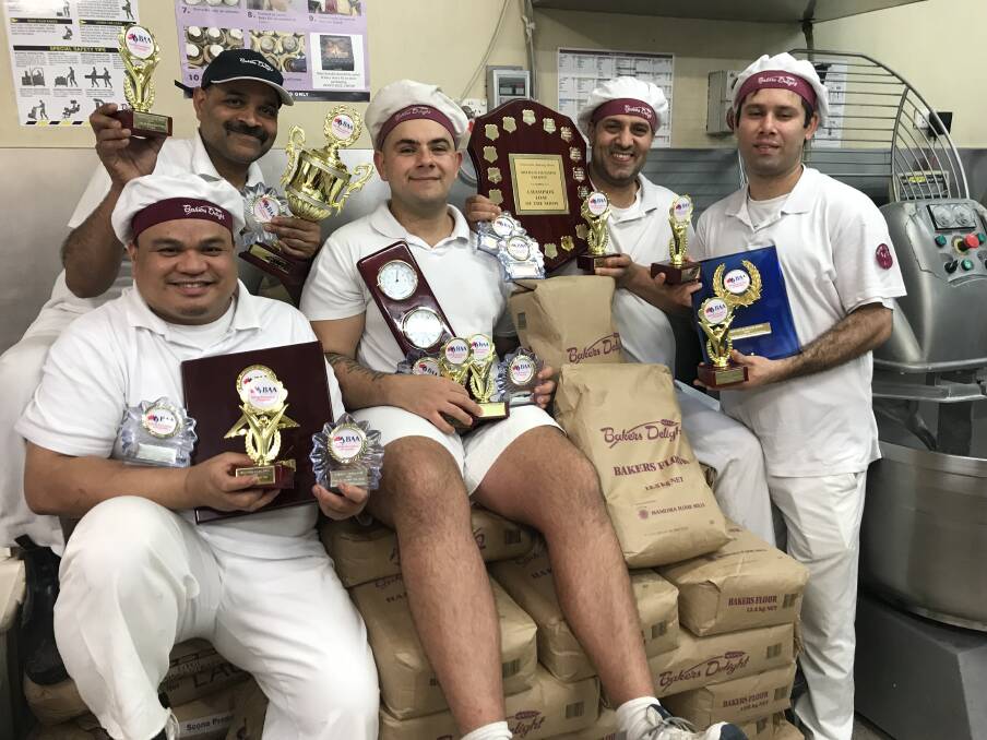 Bakers Delight Bowral and Mittagong win big. Left to right: Ratan Pal Singh, Resti Rios, William Nicolaou, JD Sharma, Sunil Sharma. Photo: supplied.