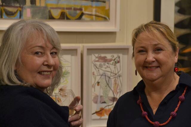 A passion for Highlands art: Lynne Moriarty (left) with Leanne Booth at the Bowral Gallery opening. Photo: supplied.