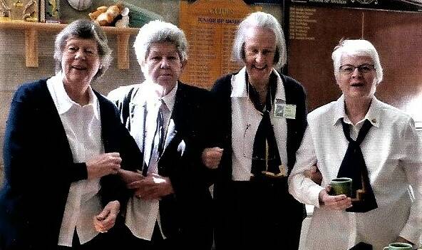 The Bowral Trefoil Guild seek contributions for this history book. L to R: Jill Kohlhagen, Roslyn Parsons, Ros Hinde, and Patsy Hughes. Photo: supplied.