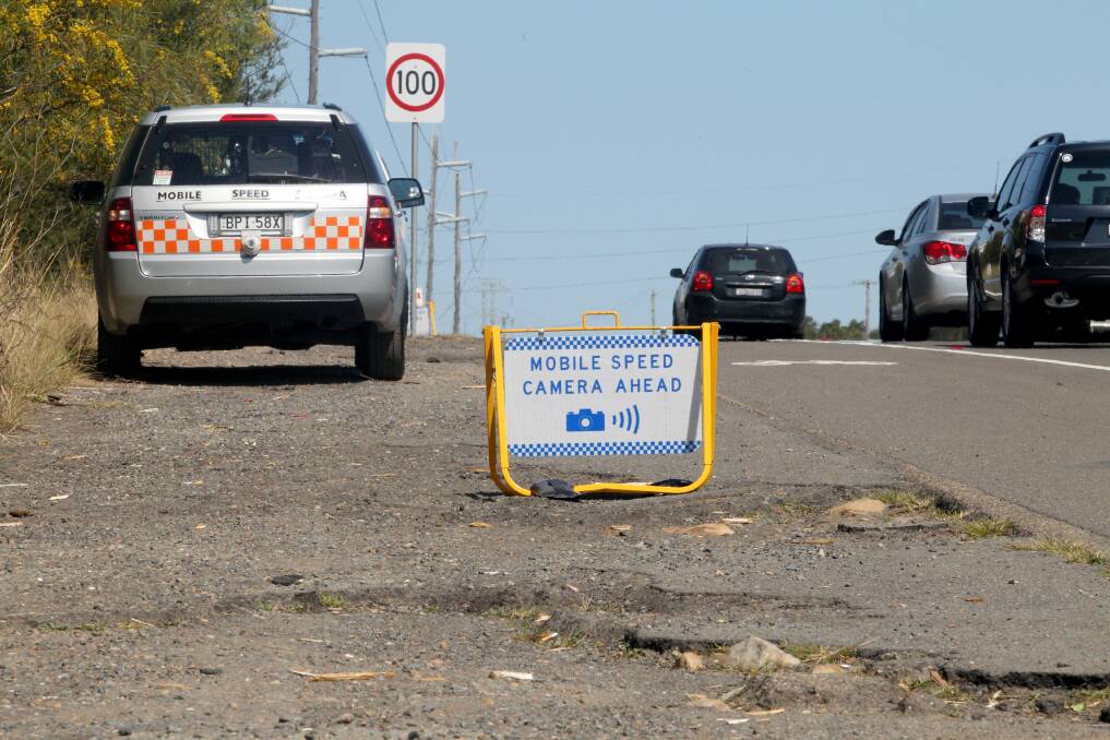 The required signage for mobile speed cameras reduce its effectiveness as a deterrent to speeding, according to a NSW Auditor-General's report. Picture: Jane Dyson