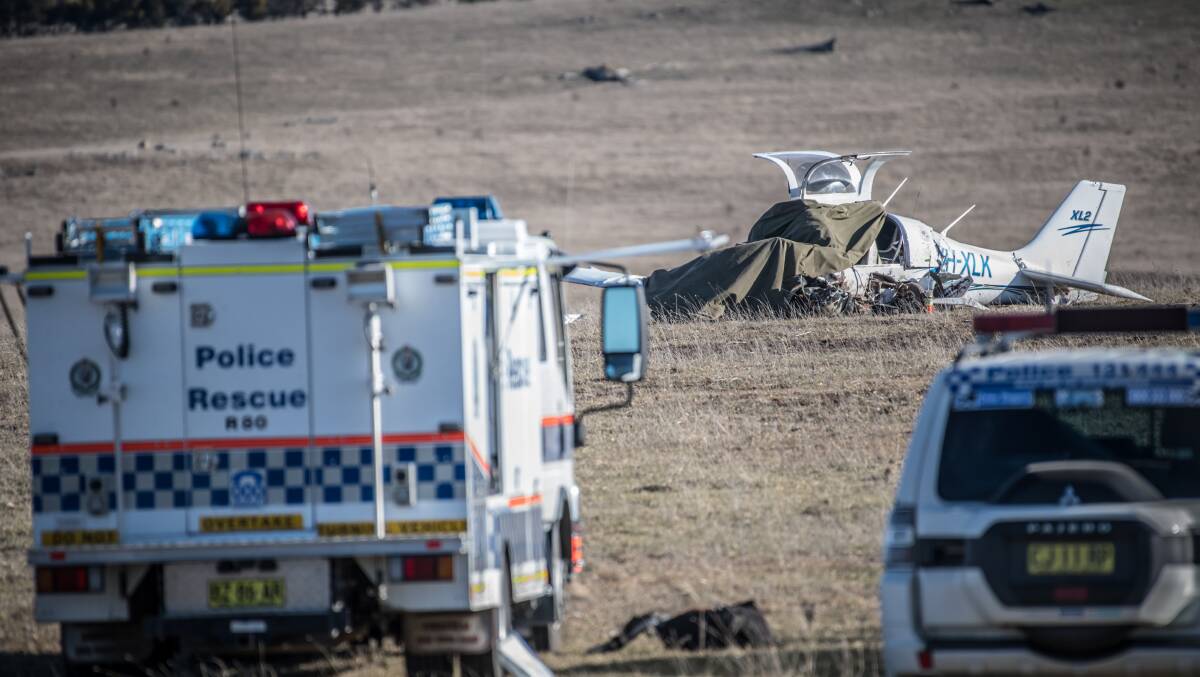 Emergency services at the scene of the plane crash in the Braidwood area, 90 kilometres to the east of Canberra. Picture: Karleen Minney