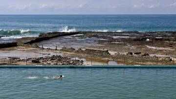 A swimmer at Woonona Rock Pool. Picture by Adam McLean