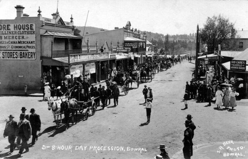 FROM THE ASHES: The shops destroyed in Bowral's 1890 fire were replaced by the two-storey buildings seen at the centre of this 1909 Bong Bong Street scene. Photo: BDHandFHS