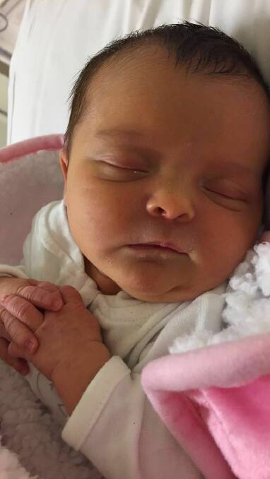 GORGEOUS: Little lady Charlotte Chapman has a snooze with her hands folded tidily.
