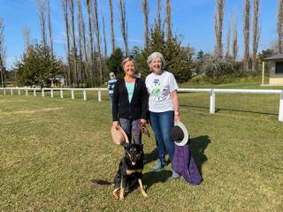 Mandy Noble and Frances Simons, president of Exter CWA, with dog Baxter.