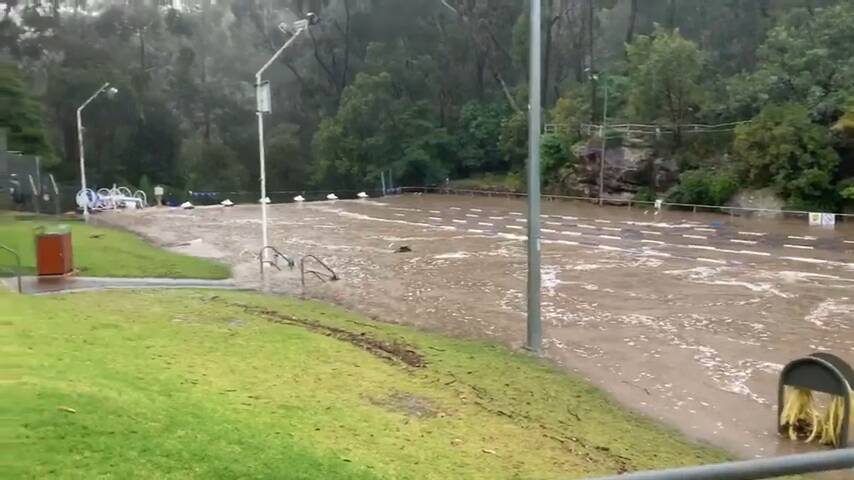 Mittagong Pool inundated by flood water yesterday afternoon.