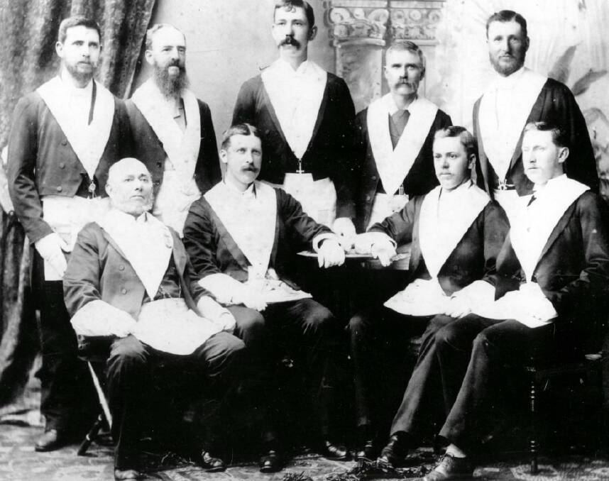 IN FULL REGALIA: Samuel Tonks the tailor is at back centre in this 1888 photo of Masonic Lodge Carnarvon, Bowral. Photo: BDH&FHS.