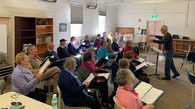 The Highlands Singers are practicing some old favourites. Photo: supplied