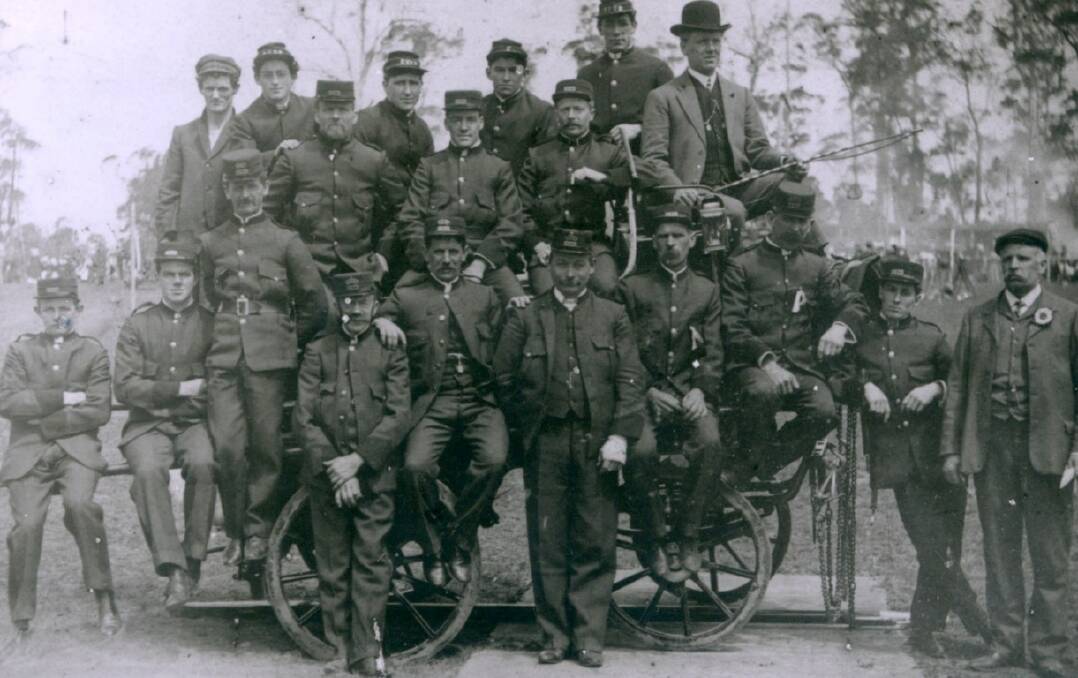 FIRE VOLUNTEERS: Bowral’s local brigade, the photo perhaps in honour of a new engine, c1910. Photo: BDH&FHS.
