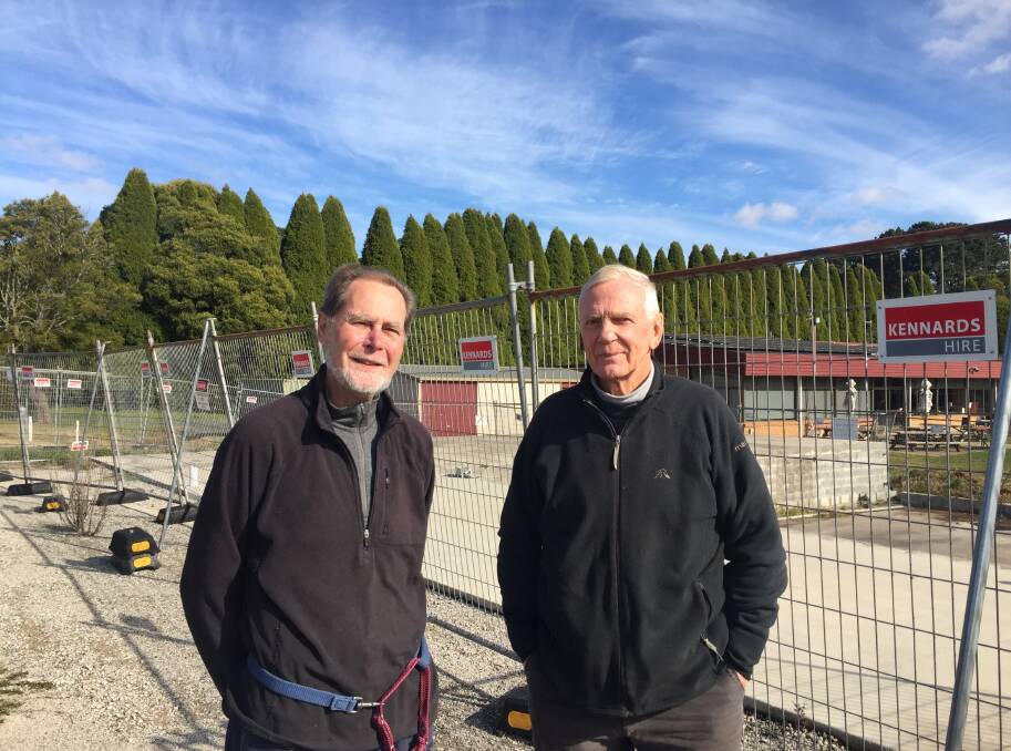 Committee member and architect Nicholas Gray and committee chair Neville Fredericks at the beleaguered site of the long-awaited Robertson pool. The committee just missed out on a State government grant, but have their eye on a Federal one. Photo: Michelle Haines Thomas