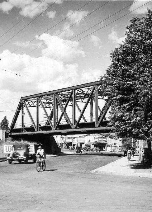 OVER ARGYLE ST: Moss Vale’s rail bridge built in 1915 for duplicated line; this photo c1940. Photo: BDH&FHS.