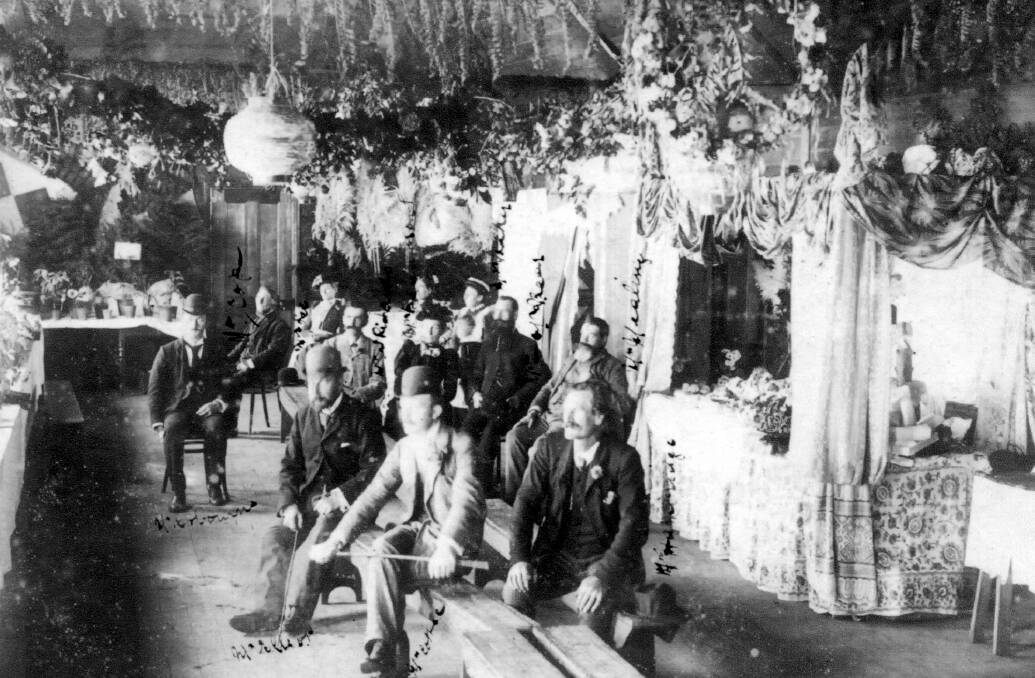 CREDITABLE: Guests and decorations at Mittagong’s first major flower show in 1889.  Photo: BDH&FHS