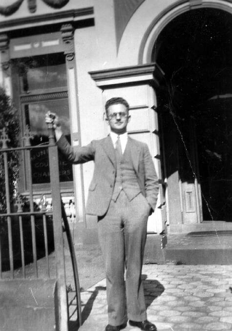 LONG SERVICE: AVJ 'Jack' Parry at front of Bowral Town Hall. He was deputy town clerk from 1946 and town clerk from 1968 to 1973, as well as being official historian. Photo: BDH&FHS.