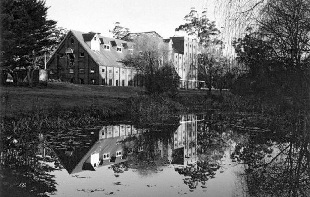 BUCOLIC: The Mittagong Maltings reflected in the waters of Nattai Creek, prior to its closure in 1980. Photos: BDH&FHS.