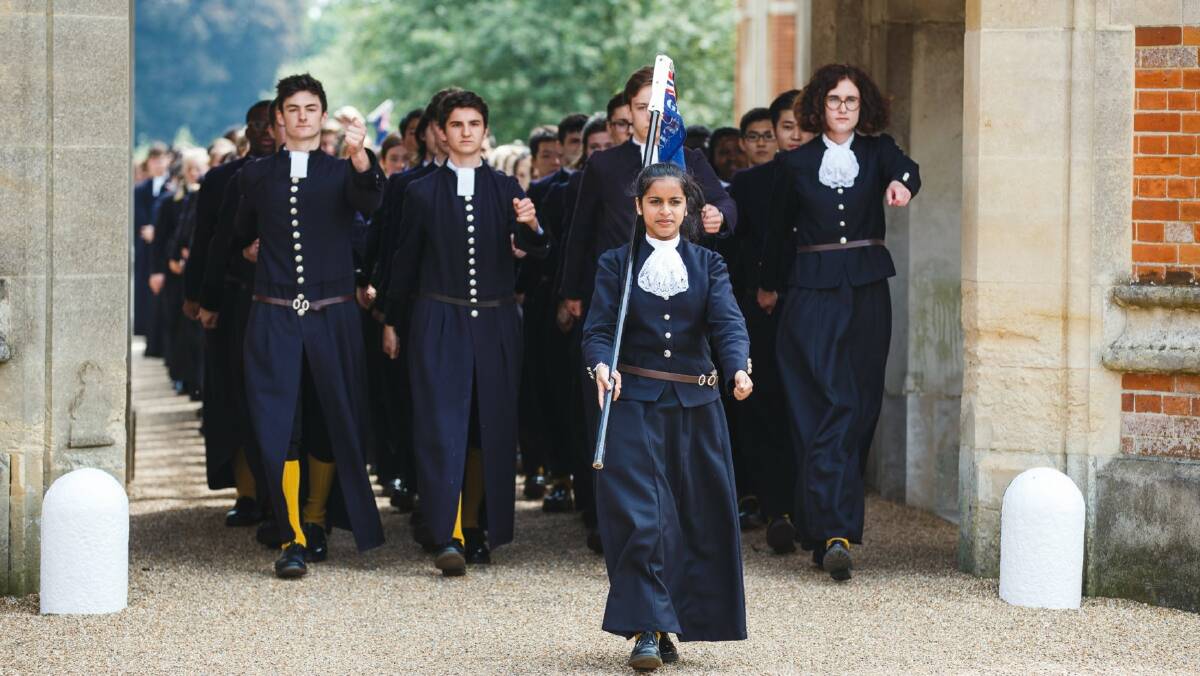 MOVING FORWARD: Pupils decked out in their Tudor-style uniforms march daily to the school’s dining hall to eat lunch. Photo: Christ’s Hospital School