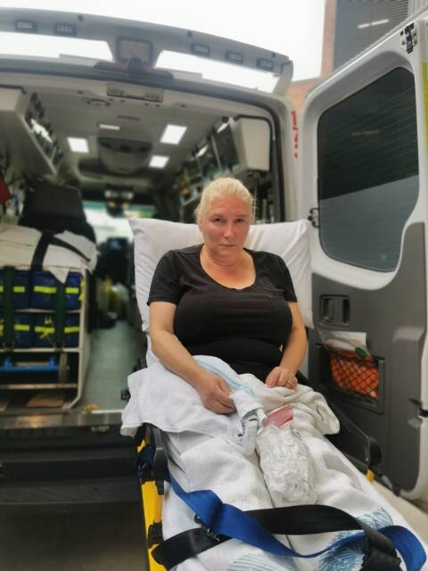 Laurance Bourrigaud on her way to hospital last Friday - she says the smell has induced nausea, vomiting, headaches and hypertension. Photo: supplied