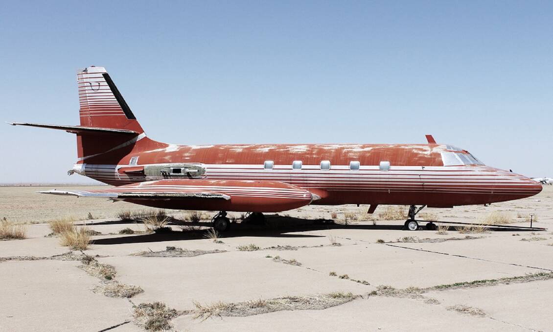 HIGH FLYER: The Lockheed Jetstar once owned by Elvis Presley, which has just sold at auction for US$430,000 after sitting idle for 30 years in the open at an airport in New Mexico. Photo: GWS Auctions.