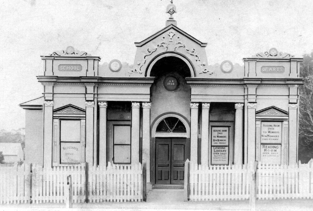 TIGHT SQUEEZE: By the 1890s, Bowral School of Arts was too small for Flower Shows and other uses; a 2nd storey was added in 1913.  Photo: BDH&FHS.