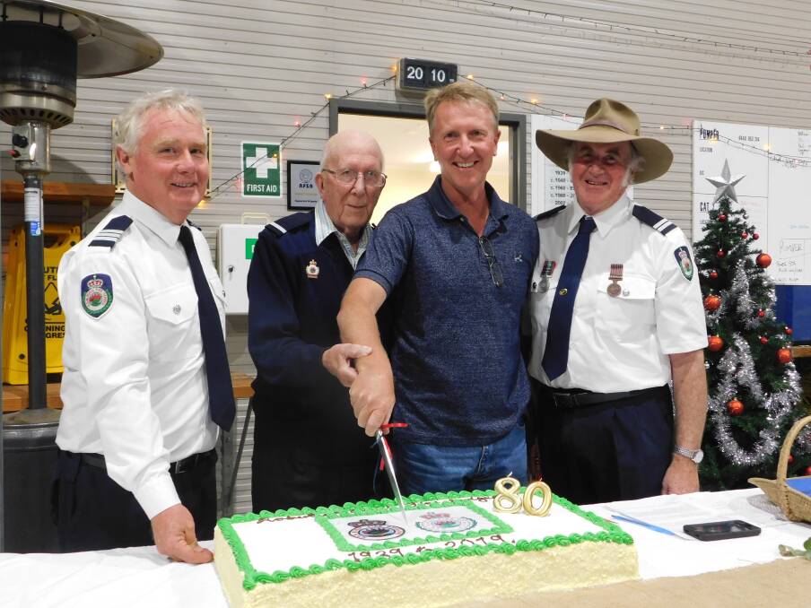 SIGNIFICANT: Current Robertson RFS captain Brendhan Waters, with previous captains Jim Wilson Sr, Jim Wilson Jr and John Alcorn. Photo: Quentin Waters