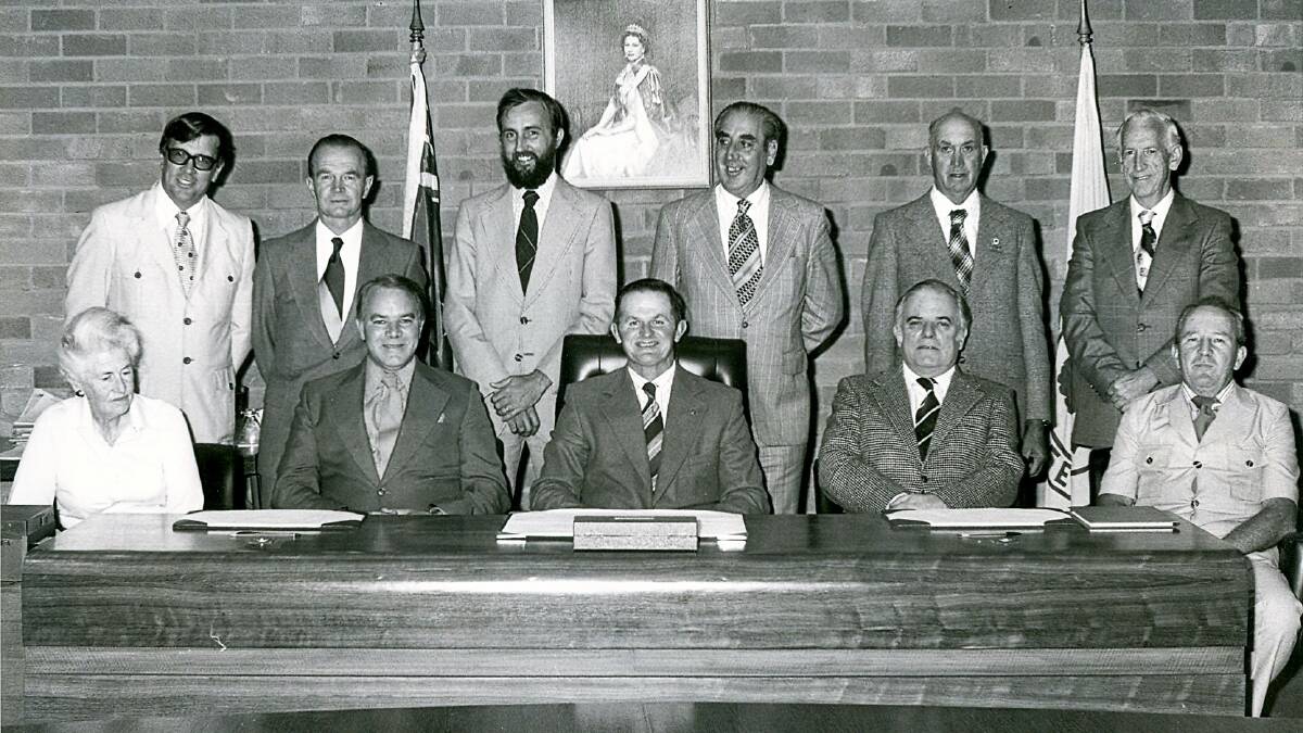 END OF AN ERA: This was the last of the old Wingecarribee Councils before amalgamation in 1981. At the back are Bill Naylor (Health and Building chief), Richie Tebbutt, Tim McKinnon, Harold Jopling (shire clerk), Horace Quigg, Roy Baker (shire engineer). At the front are Rachel Roxburgh, Laurie Jones, Geoff Larsen (shire president), Bill Engelbach and Bill Missingham.