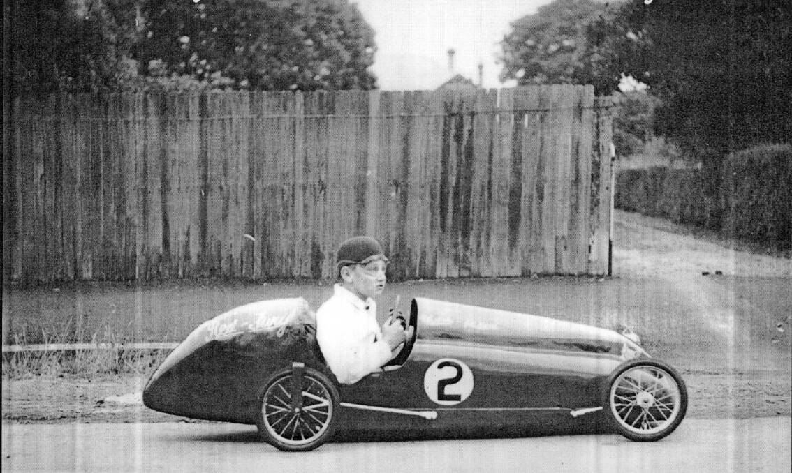 STREAMLINED: Daryl Smith in the King & Moore entry, Red Fury, in the Bowral Soap Box Derby, 1950. Photo: BDH&FHS.