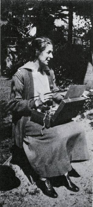 Clarice Beckett painting in her garden not long before she died at the age of 48. Photo: courtesy AGSA