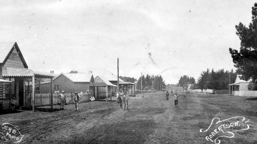 SLOW START: Robertsons main street in early 1900s, with saddlery store on left. Photo: BDH&FHS 