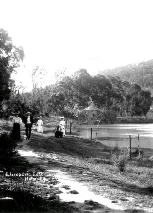 SCENIC WALK: A pleasant spot of leisure at Mittagong’s Lake Alexandra, c1920. On the photo it is spelt as ‘Alexandria’. Photo: BDH&FHS.