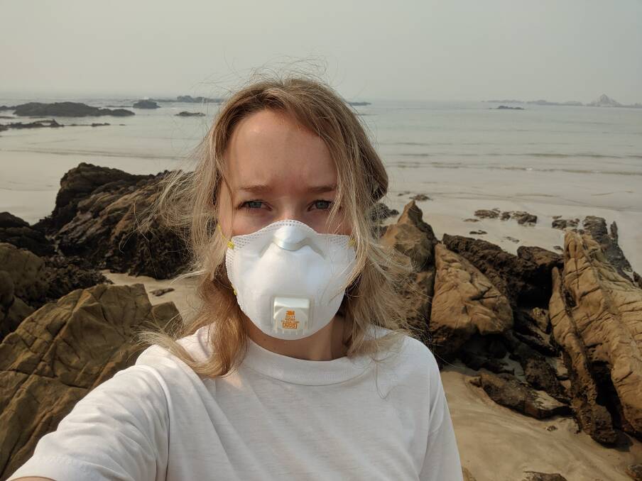 Australian Community Media reporter Andrea Cantle wore a P2 mask in December 2019 during the South Coast bushfires. In March 2020, another mask is worn.