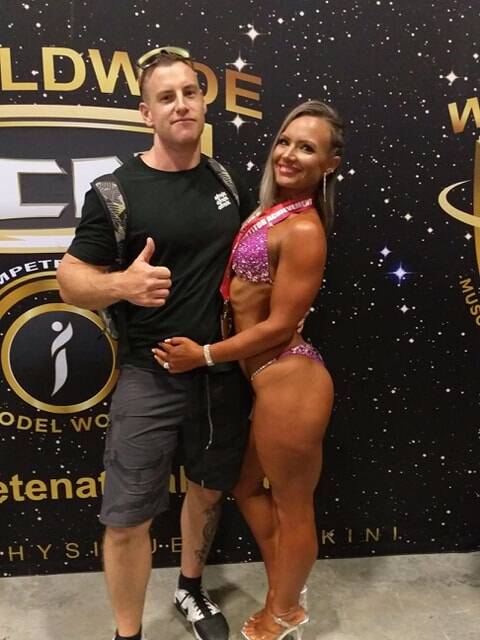 GOALS: Clair and her "number one support", husband Daniel. The 34-year-old competed in a fitness competition last month. Photo: supplied. 