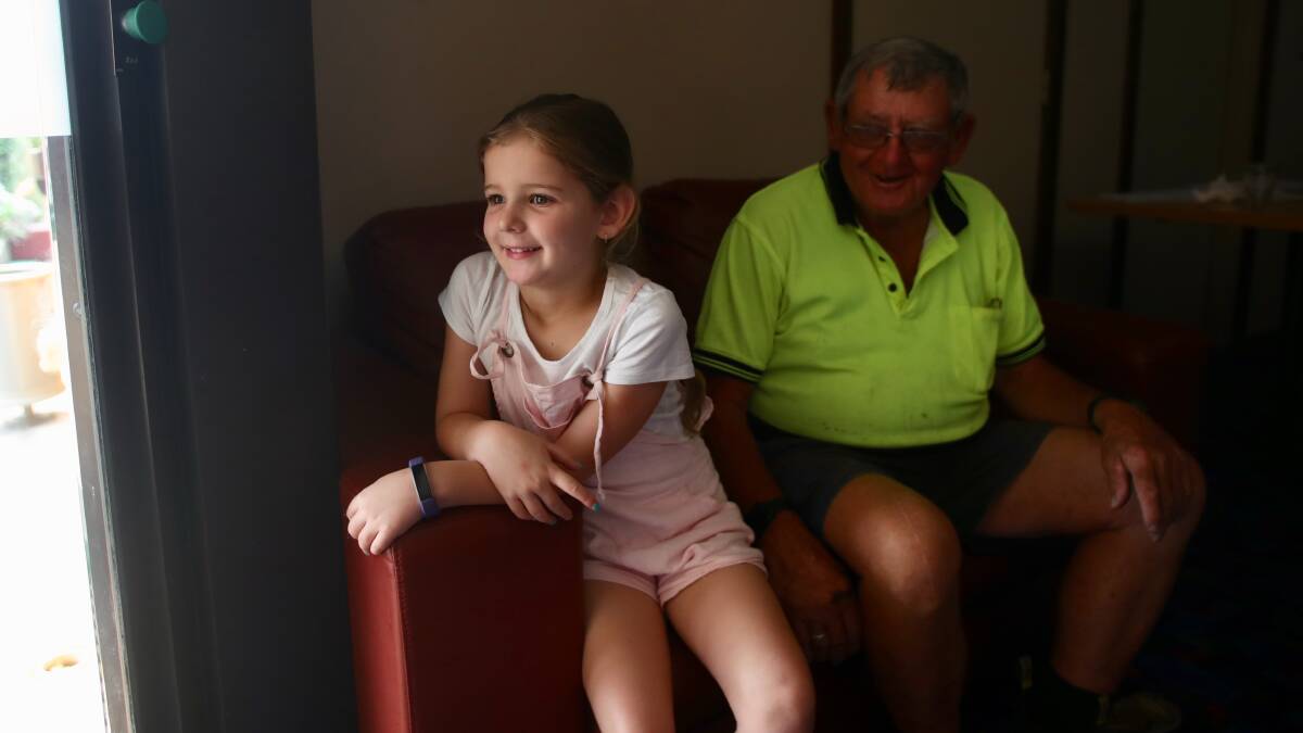 Lara Sanderson with grandfather Terry Burn at Picton Bowling Club. Photo: Adam Mclean
