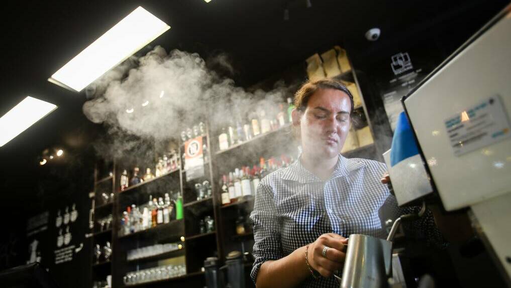 A Wollongong woman working as a waitress at a local venue. 