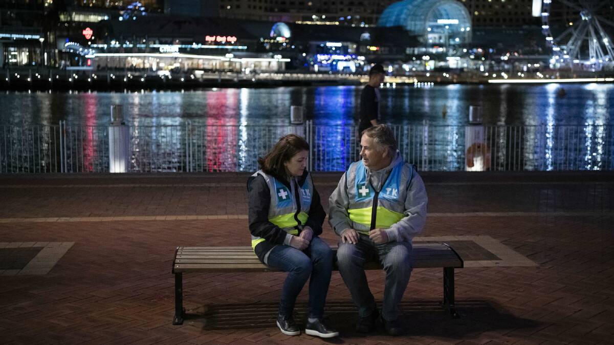 Kathy and Ralph Kelly in Sydneys Darling Harbour, on patrol with the Take Kare program, which protects young people at night. Photo: Nic Walker