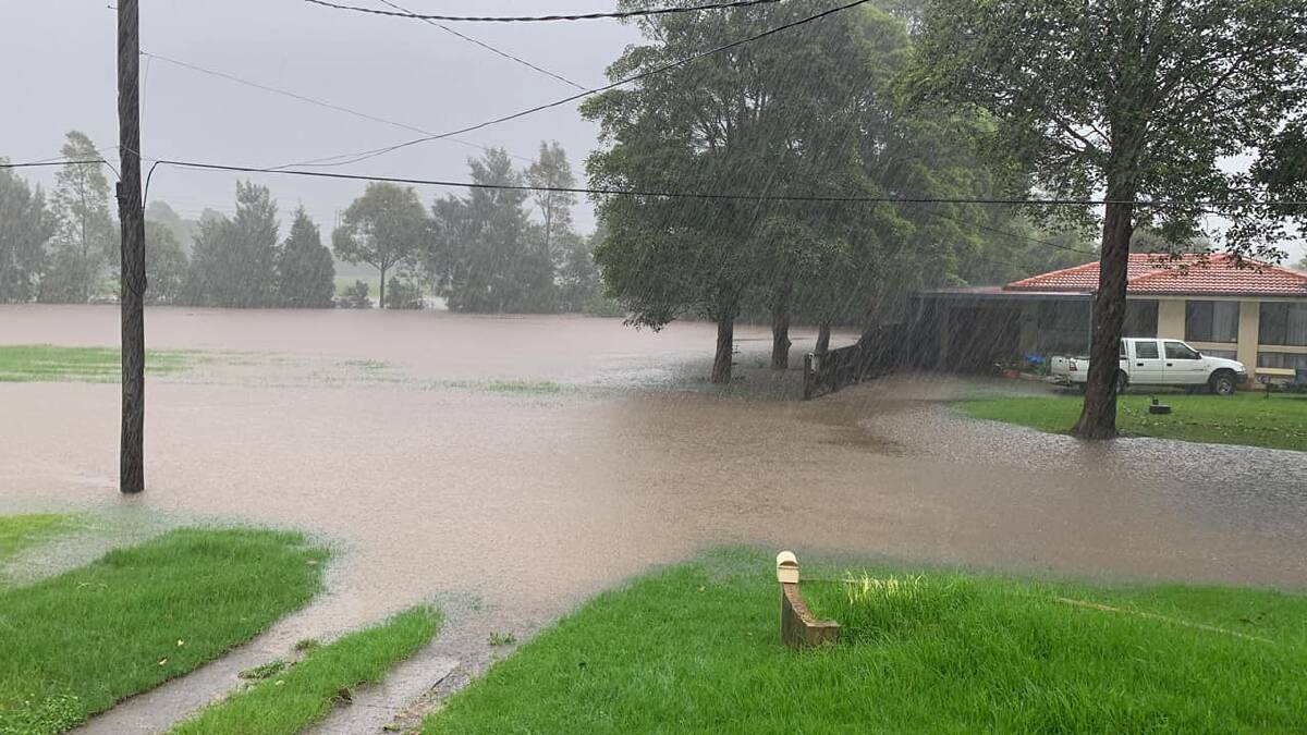 The bottom end of Polock Crescent in Albion Park is under water. Photo: Trina Richardson