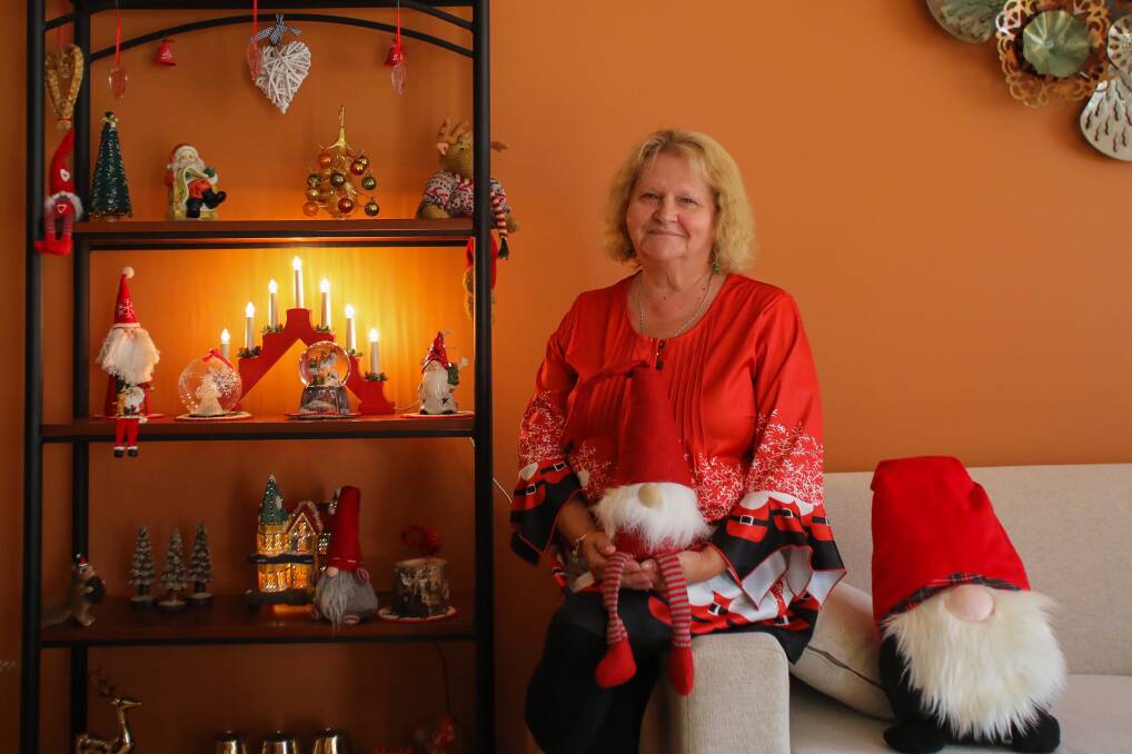 Christina Dawson with some of her Finnish Christmas decorations - including a couple of cheeky Tomte Men. Picture: Wesley Lonergan.