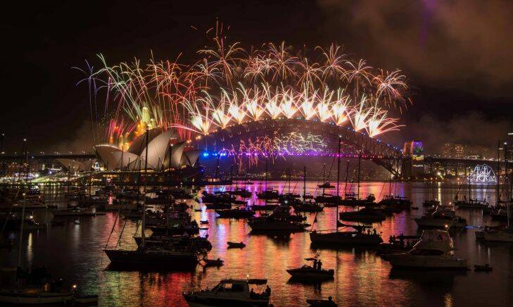 Sydney NYE 2016. The 12am New Year's Eve fireworks on Sydney Harbour, viewed from Mrs Macquarie's Chair. 1 January 2017. Photo: Wolter Peeters